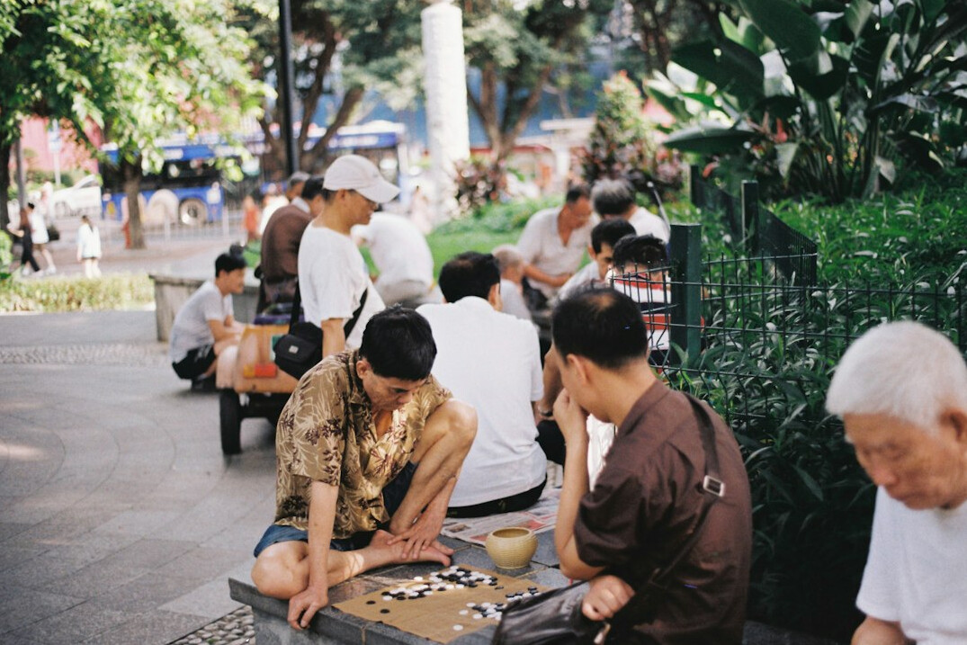 group of seniors playing board games