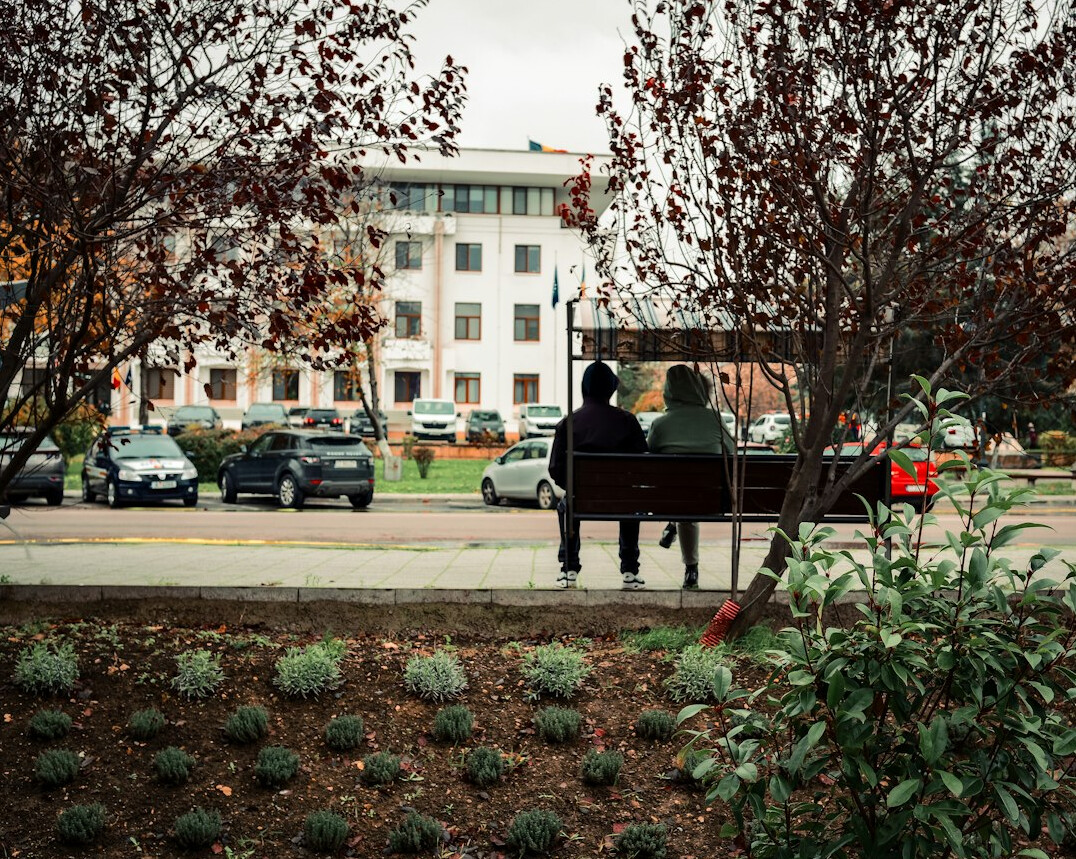 senior couple walking in neighborhood