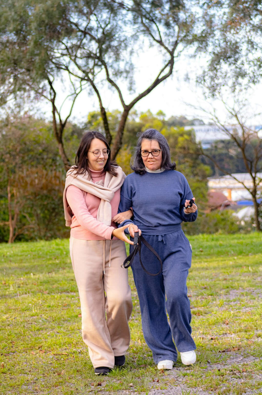 seniors walking in park together