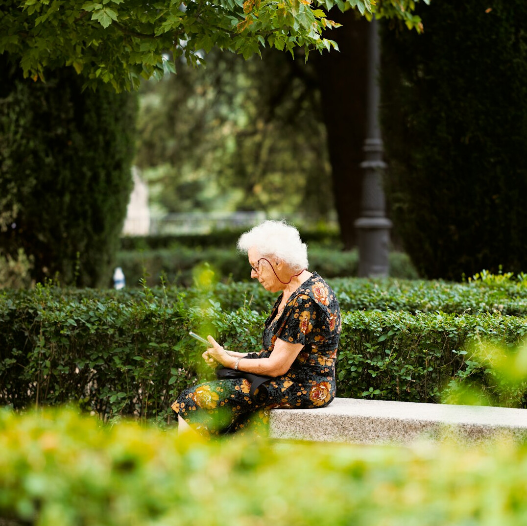 senior woman reading book