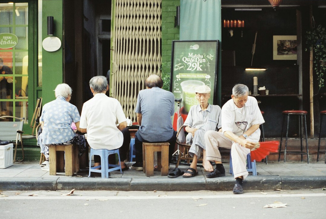 senior people chatting in neighborhood