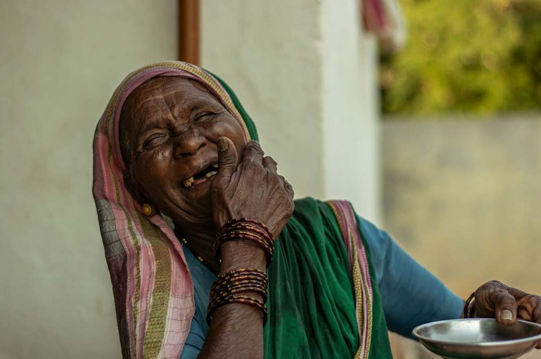 Portrait of an elderly woman laughing
