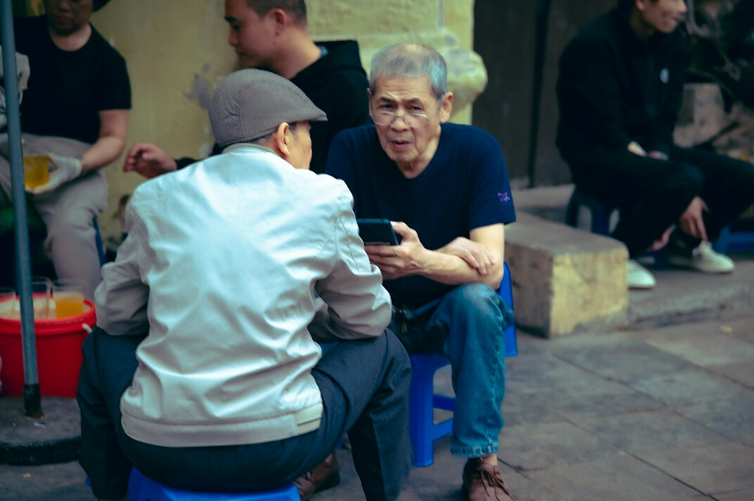 senior people chatting in neighborhood